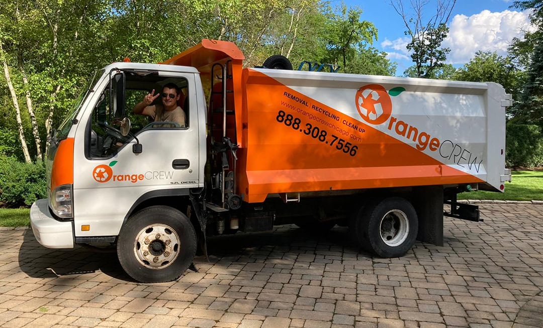 orange crew junk removal truck