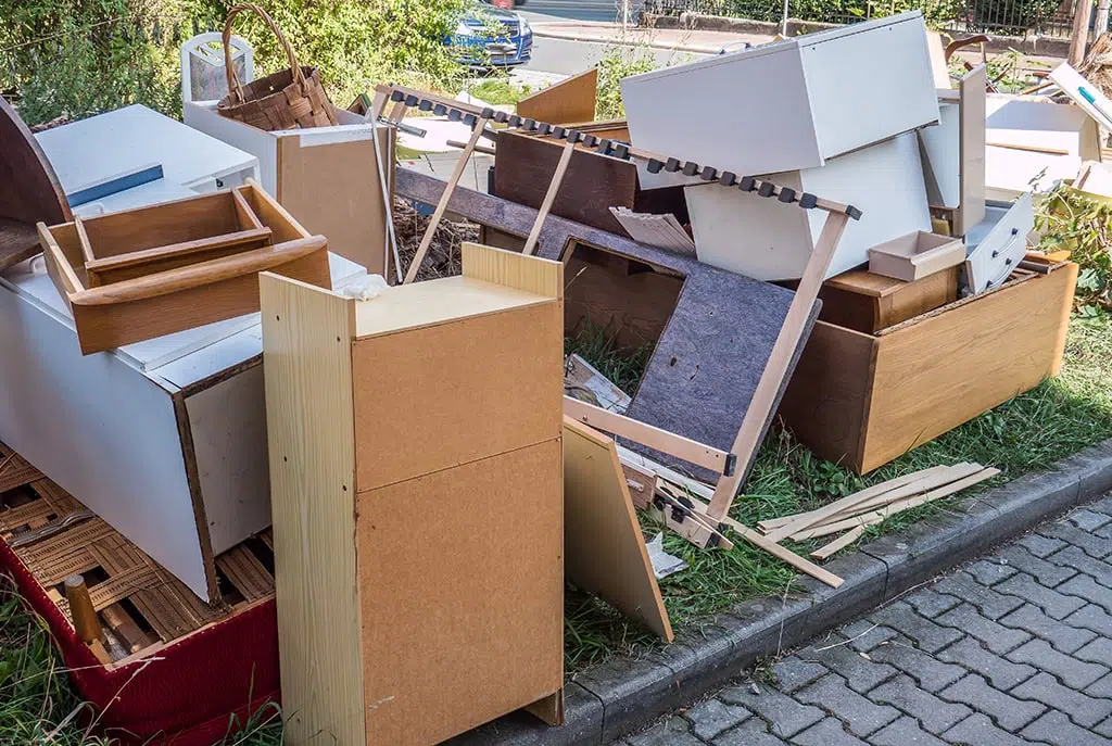 old broken up furniture on the curb
