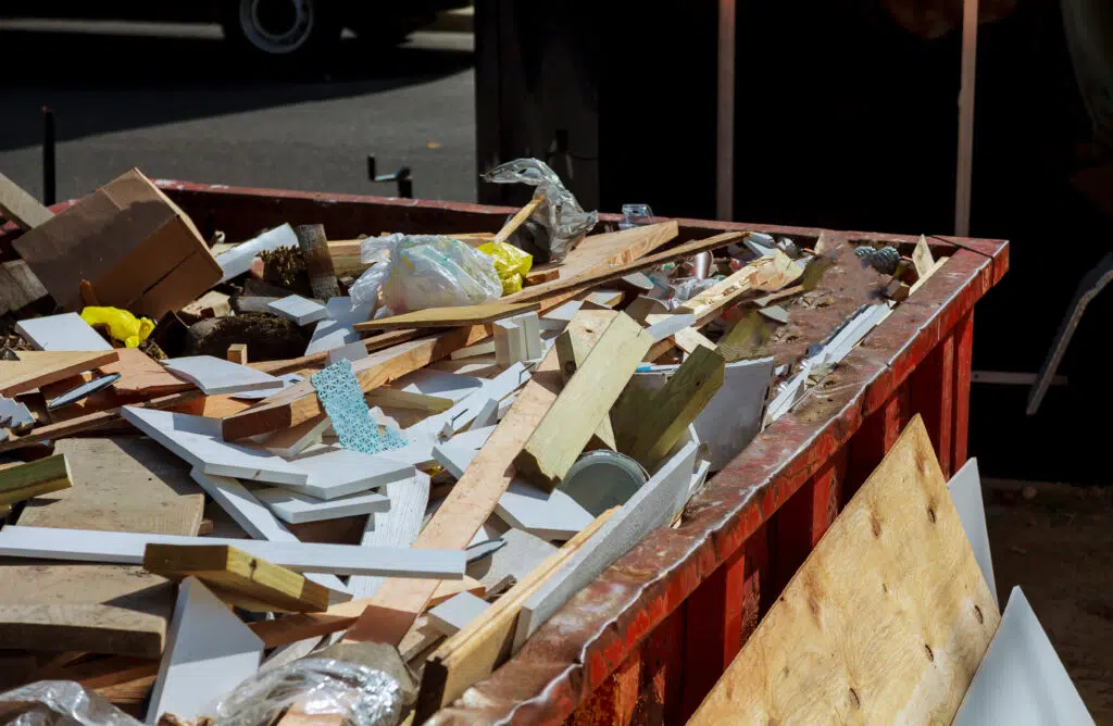 Dumpster being full with garbage