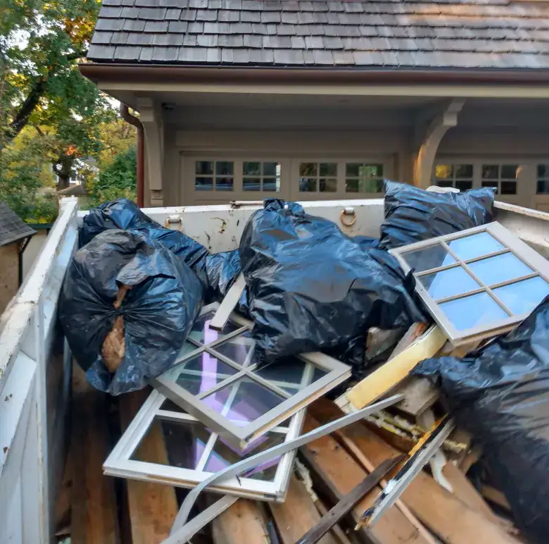 truck bed filled with remodeling debris