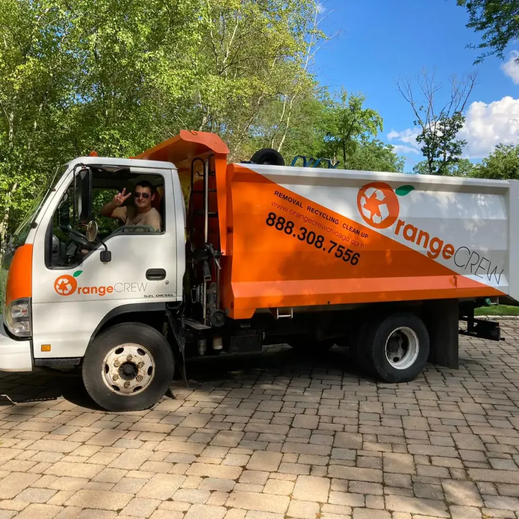 smiling man in the orange crew truck
