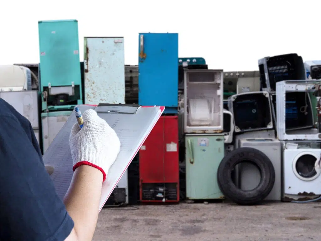 old electronics pilled up for appliance removal