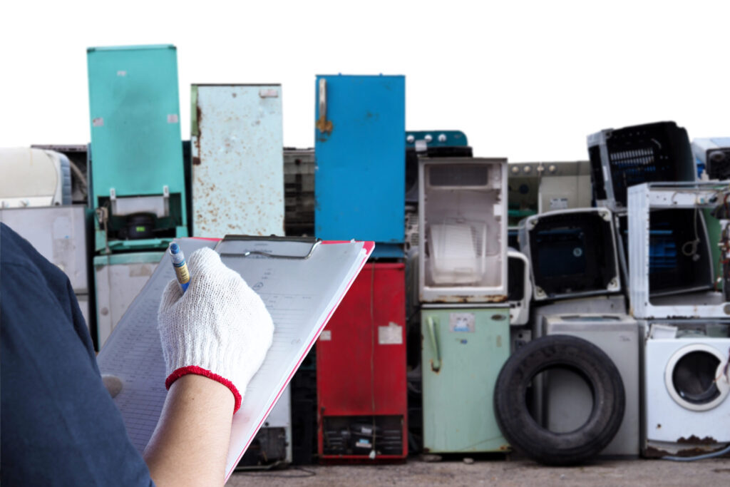old electronics pilled up for appliance removal